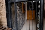 Shattered glass marks the entrance of the Freedom Theatre's offices in the Jenin refugee camp. Residents say Israeli soldiers vandalized the premises.