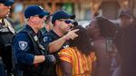 Brittany Martin, center,  confronts police as demonstrators march in protest of George Floyd's death May 2020 in downtown Sumter, S.C. Martin, a pregnant Black activist serving four years in prison for her behavior at racial justice protests, is scheduled to have her sentence reconsidered as she struggles to reach her due date behind bars.