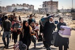 Displaced Palestinians flee from Khan Younis in the southern Gaza Strip on Jan. 30.