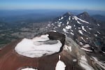 An aerial view from the south of South Sister, Middle Sister and North Sister in Oregon's Cascade Range.