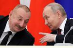 Russian President Vladimir Putin, right, and Azerbaijani President Ilham Aliyev attend a meeting with railway industry veterans and workers to mark the 50th anniversary of the Baikal-Amur Mainline (BAM) construction at the Kremlin in Moscow, Russia, Monday, April 22, 2024.