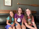 From left to right, Sylvie, Penelope and Olive, pose for a portrait after their postcard interview on March 20, 2020.