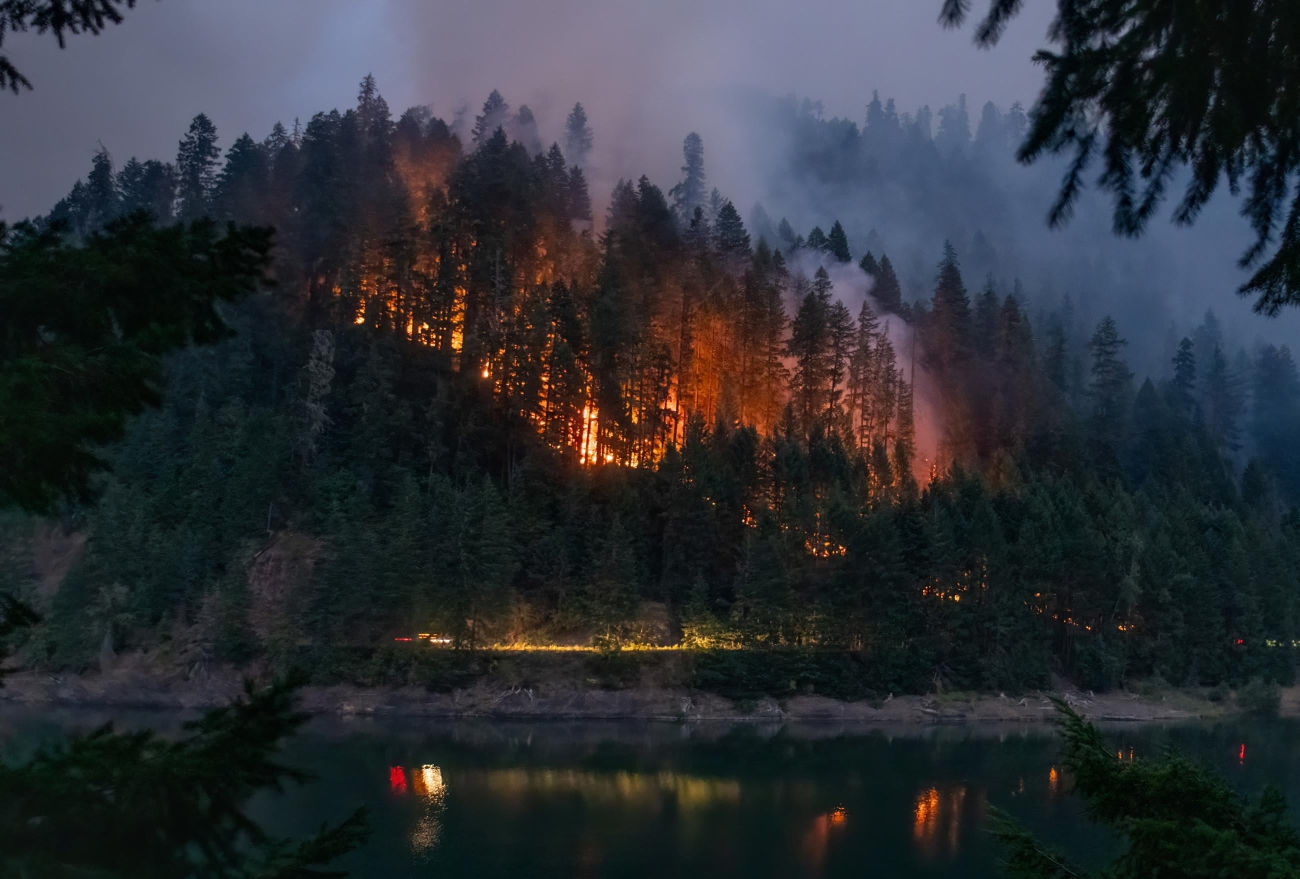 FILE - In this supplied photo, the Coffeepot Fire north of Oakridge is seen at night on Aug. 2, 2024.