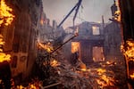 Tuesday, Jan. 7: The Palisades Fire engulfs homes in the Pacific Palisades neighborhood of Los Angeles.