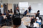 Advancement Via Individual Determination or AVID teacher Greg Karakashian addresses his students in class at the newly rebuilt Beaverton High School on the first day of the 2026-2027 school year in Beaverton, Ore., on Aug. 26, 2026.