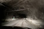 In the main tunnel into the LKAB mine, reflectors on the reinforced stone walls guide vehicles deep underground.