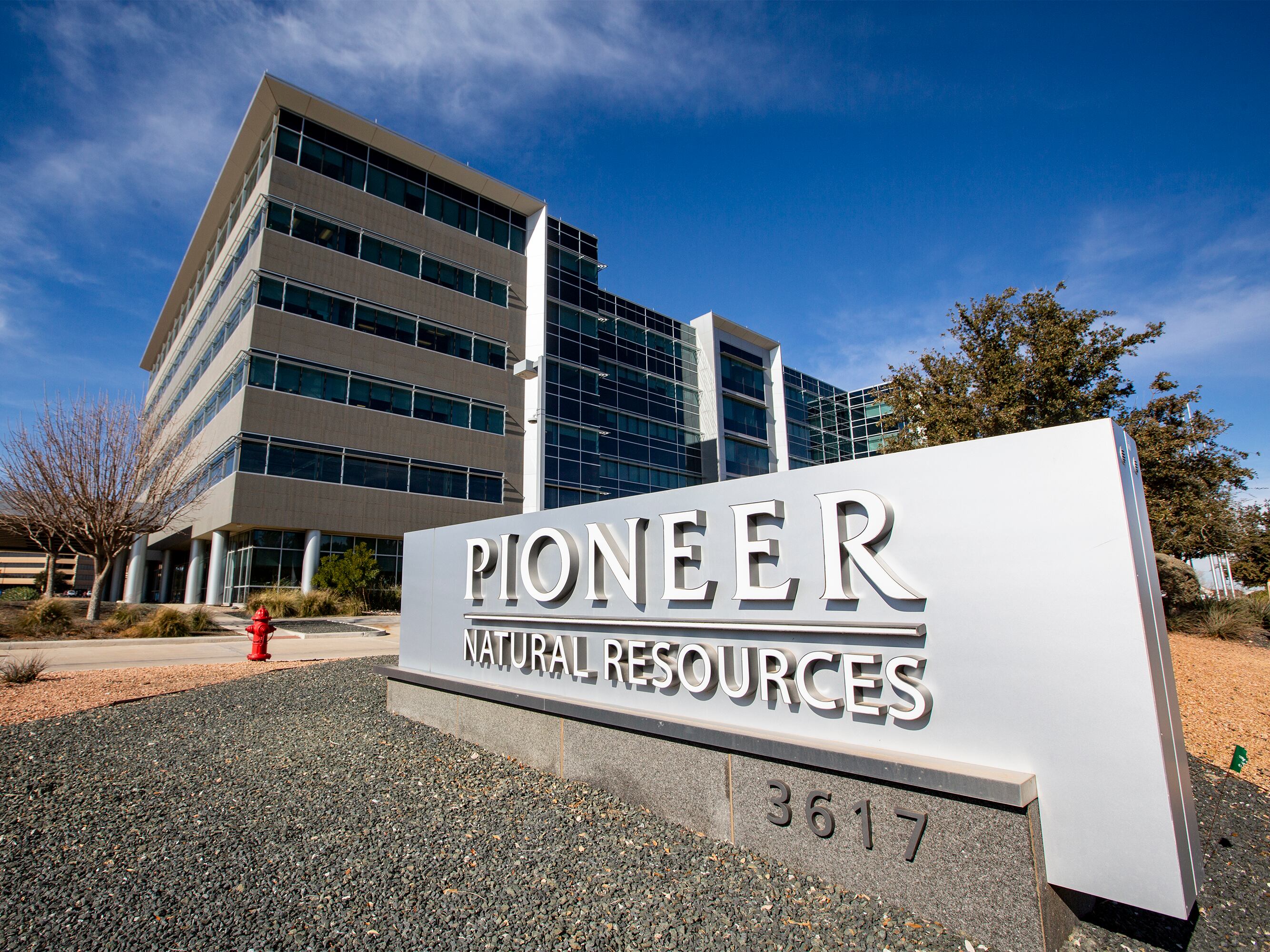 Pioneer Natural Resources' office is shown on Jan. 13, 2021, in Midland, Texas. Exxon Mobil's $60 billion deal to buy Pioneer has received clearance from the Federal Trade Commission, but the former CEO of Pioneer was barred from joining the new company's board of directors.