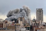 FILE - A plume of smoke rises after a strike in Tehran, Iran, Monday, March 2, 2026.
