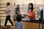 Face masks and plastic shields remained in place as the Gresham Library reopened recently.