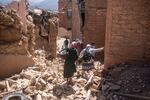 Residents flee their homes after an earthquake in Moulay Brahim village, near the epi centre of the earthquake, outside Marrakech, Morocco.