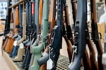 A rack of guns at Gator’s Custom Guns in Kelso, Wash., April 16, 2024. Uncertainty around gun laws drives Rogue Valley residents to stock up.