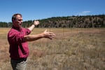 Ben Walsh stands at a corner of his family's property outside Sisters, Ore., on July 9, 2026.