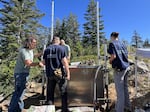 (L-R) Dylan Whitney, Ben Aldridge, Hayden Peabody and Karlee Giuntoli inspect the power source panel for the seismic sensors.