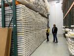 Researcher Chris Goldfinger joins curator Val Stanley in the chilled repository where geologic sediment cores are kept at Oregon State University in Corvallis.