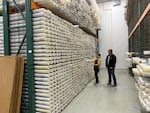 Researcher Chris Goldfinger joins curator Val Stanley in the chilled repository where geologic sediment cores are kept at Oregon State University in Corvallis.