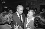 Robert Strauss, campaign chairman for President Jimmy Carter, listens to Washington Gov. Dixy Lee Ray at a Democratic fund raising reception in afternoon on Thursday, Feb. 7, 1980 in Seattle.