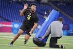 FILE - Oregon defensive lineman Derrick Harmon runs a drill at the NFL football scouting combine in Indianapolis, Thursday, Feb. 27, 2025.