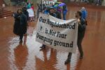 A few dozen protesters gathered in Portland's Pioneer Courthouse Square before marching to the nearby Department of Environmental Quality office. They want tighter regulation of industrial air emissions.