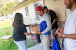 Alejandra Hernandez delivers drinks and other supplies to migrant farmworkers in Hammett, Idaho.