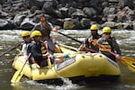 Rafters with Indigo Creek Outfitters from Phoenix, Ore. take their first paddle strokes after departing from Spring Island on the Upper Klamath River in June 2023.