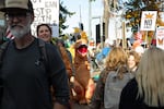 Hundreds of people fill the sidewalks for the No Kings protest in Bend, Ore., on Oct. 18, 2025.