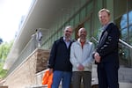 From left, Ron Blaj, Dan Zalkow and Jason Franklin - three of the leaders of Portland State University's campus overhaul - stand in front of the new Peter Stott Center in April 2018.