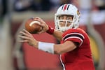 FILE - Louisville quarterback Will Stein readies a pass during the first half of their NCAA college football game against Florida International, Sept. 9, 2011, in Louisville, Ky.