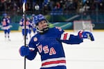 Ella Shelton of Canada (L) and Tessa Janecke (R) the United States skate after the puck in the second period during the Women's Gold Medal at the 2026 Winter Olympics on Thursday in Milan, Italy.
