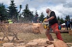 Randy Irwin competes in the at the Sandy Invitational Chainsaw Competition and Forest Festival on June 6,2026 in Sandy, Ore. This is the fourth year of the event, which hosts a range of judged sporting events including a three-day chainsaw carving competition.