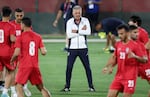 Iran's coach, Carlos Queiroz, heads a training session at in Doha on Monday. Iran can tie the U.S. and still advance, but is expected to hold nothing back in pursuit of a win.