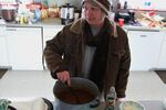 Kristi Jernigan, Christian missionary from Tennessee, stirs a pot of chili. She stayed at the occupied refuge for about a week before returning home. “I am here strictly to bring people to salvation if that is God’s will,” she said.