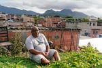 Luis Cassiano is the founder of Teto Verde Favela, a nonprofit that teaches favela residents in Rio de Janeiro, Brazil, how to build their own green roofs as a way to beat the heat. He's photographed at his house, which has a green roof.