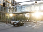 Rideshare vehicles share the road with other drivers in downtown Minneapolis.