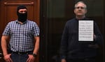 American Paul Whelan, who was arrested in Russia in 2018 and charged with espionage, stands inside the defendant's cage as he awaited his verdict in 2020. He was convicted and sentenced to 16 years.
