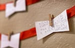 Words of encouragement are added to an anonymous message on a display at the Youth Villages office in Lake Oswego, March 2, 2023. Youth Villages supports kids up to 18 with emotional or behavioral problems through their in-home Intercept program. 