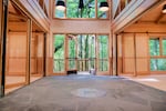 This photo taken on Sep. 13, 2025, shows the hallway inside the pavilion which separates two classrooms and is made of bluestone chosen to represent Columbia River basalt. A covered fire pit lies in the middle of the hallway.