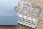 A photograph of a blister-pack of birth control pills.