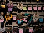 Supporters of Missouri's ban on gender-affirming care for minors gather on the floor of the statehouse in Jefferson City in March 2023.