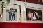 A photo of Lisa Tran's grandparents in front of their pho restaurant in Sóc Trăng, Vietnam, sits on a shelf in Tân Tân Café and Delicatessen, Beaverton, Ore., June 13, 2025. Tân Tân was founded by Vinh Tran and Hongmai Nguyen, and is now also managed by their daughter Lisa Tran. 