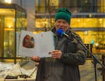 Children’s author Eric Kimmel reads his book ‘Hanukkah Bear’ with illustrations by Mike Wohnoutka to kids celebrating at Director Park on Sunday, Dec. 22, 2019, in Portland, Ore.