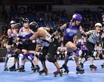 The Rose City Rollers Wheels of Justice play against the New York's Gotham All Stars during game six of the Women’s Flat Track Derby Association global championships. The Wheels of Justice went on to win the WFTDA championship, taking home a fifth win for the Rose City Rollers.