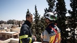 Firefighter Naser Brjas and white helmet Kinan Ali respond to an emergency call in Damascus on March 31, 2025.