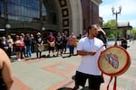 The Chinook Indian Nation gather outside a federal courthouse in Tacoma to rally support for federal recognition.