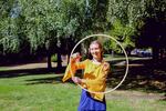 Paisley Armstrong dances with her hula hoop near Mount Tabor Park in Portland. 