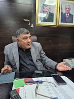 Ghassan Daghlas, the governor of Nablus, in his office.