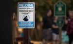 A sign warns would-be troublemakers that Maywood Park, Ore., residents are watching.