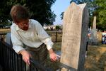 Brian Mittge, chair of the George Washington Bicentennial Committee, shows me George Washington's gravestone at Centralia's Washington Lawn Cemetery.