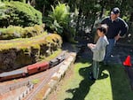 During the Rose City Garden Railway Society annual summer tour, kids are often handed the controls and allowed to run the trains, as seen in this photograph of a 9-year-old who attended the club tour in June 2024.