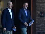 President Biden walks with his son Hunter Biden after attending mass in Johns Island, S.C. on Aug. 13, 2022.