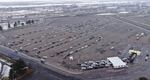 Hundreds of cars lined up for the opening day of a mass vaccination event in Washington's Tri-Cities on Monday, Jan. 25, 2021, at the Benton County Fairgrounds in Kennewick, Wash.